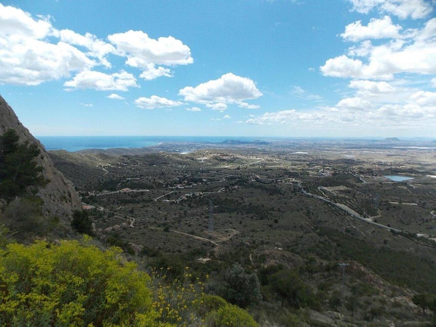 Alicante: Canelobre Caves & Busot Tour including transfer - Busot Village Stop: Ethnic Music Museum, Old Church, and Castle Ruins Views