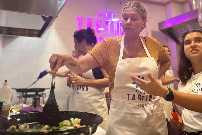 Alicante Paella Cooking Class, Tapas, Drinks and Marketplace - Hands-on paella cooking: the technique is the real payoff