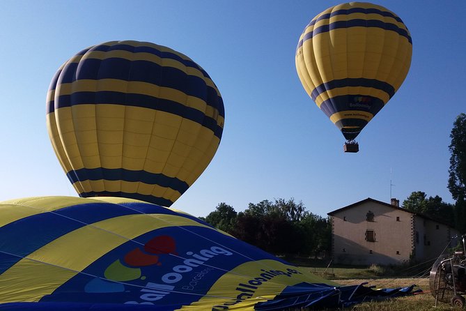 Balloon Ride over Catalonia with optional Pick-up from Barcelona - The landing scene: toast, flight certificate, and brunch