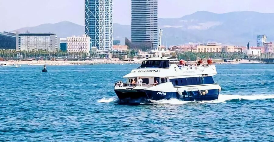 Barcelona: Boat Tour in Las Golondrinas - What the route feels like: skyline, beaches, and the working harbor