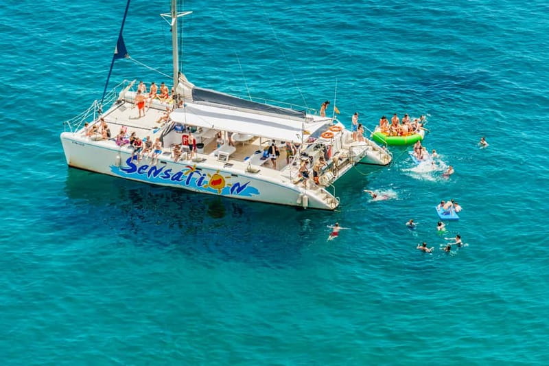 Barcelona: Catamaran Party Cruise with BBQ Meal - Where You’ll Sail: Port Olímpic to Badalona Coastline