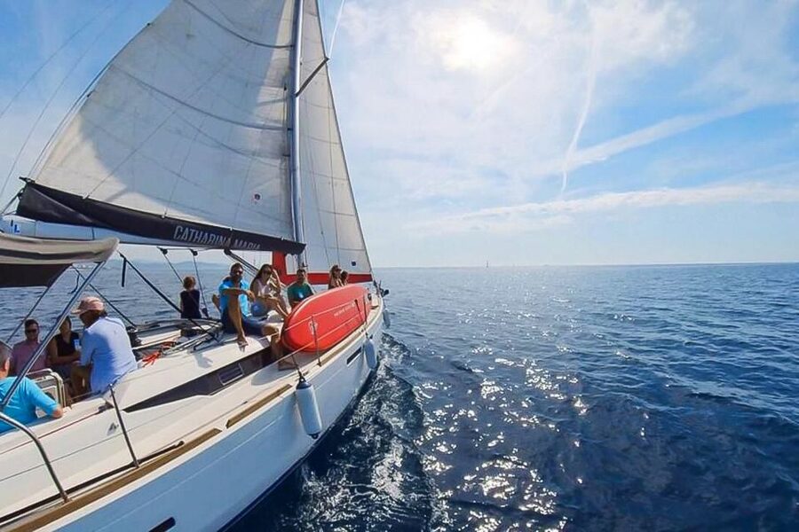 Barcelona: Coastline Boat Trip with Snacks and Cava - The swimming stop: clear water, but be realistic about conditions