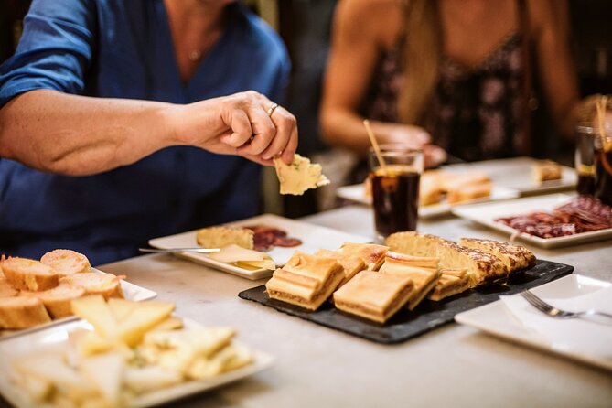 Barcelona Gothic Quarter Tapas & Taverns Food & Wine Tour - Placeta del Pi start: cured meats, cheeses, and a classic potato introduction