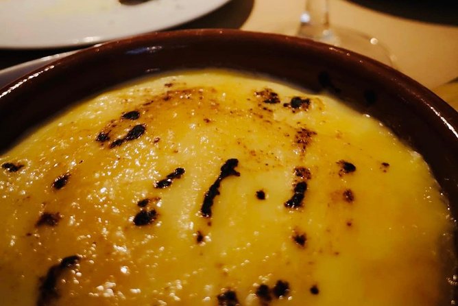 Barcelona Gothic Quarter VIP Tapas & Wine Tour - Carrer dels Assaonadors: warm family cooking and vermouth alongside savory bites