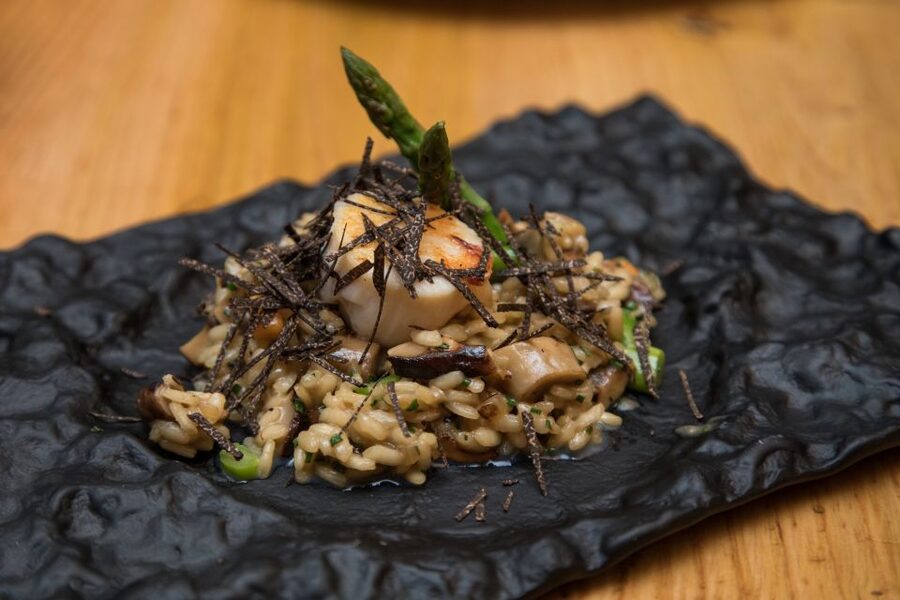 Barcelona Gourmet Food & Wine Tour with Local Expert - Stop Two: A Music Bar for Comfort Food and Barcelona Mood