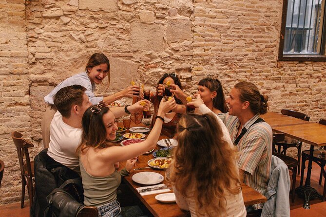 Barcelona: Guided Food Walking Tour with Tapas and Wine - Stop 2 in Carrer Ample: Croquettes, Bravas, and Padrón Feel Like Barcelona