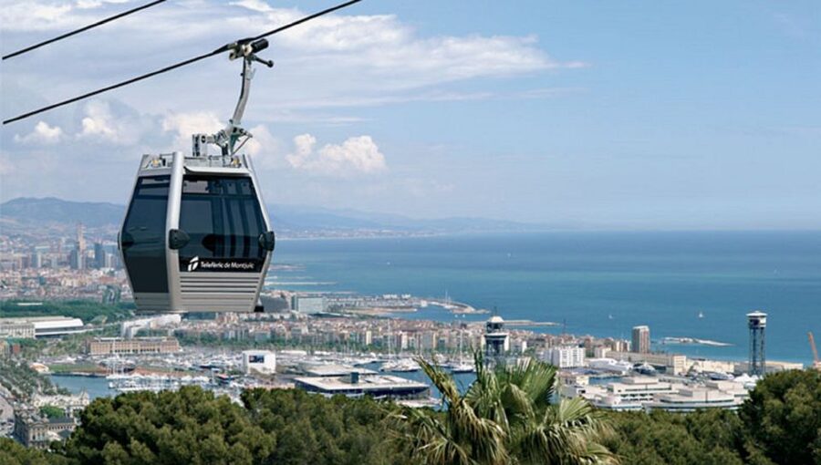 Barcelona: Montjuïc Cable Car Ticket with Audio Guide - Riding the Montjuïc Cable Car with story-based audio