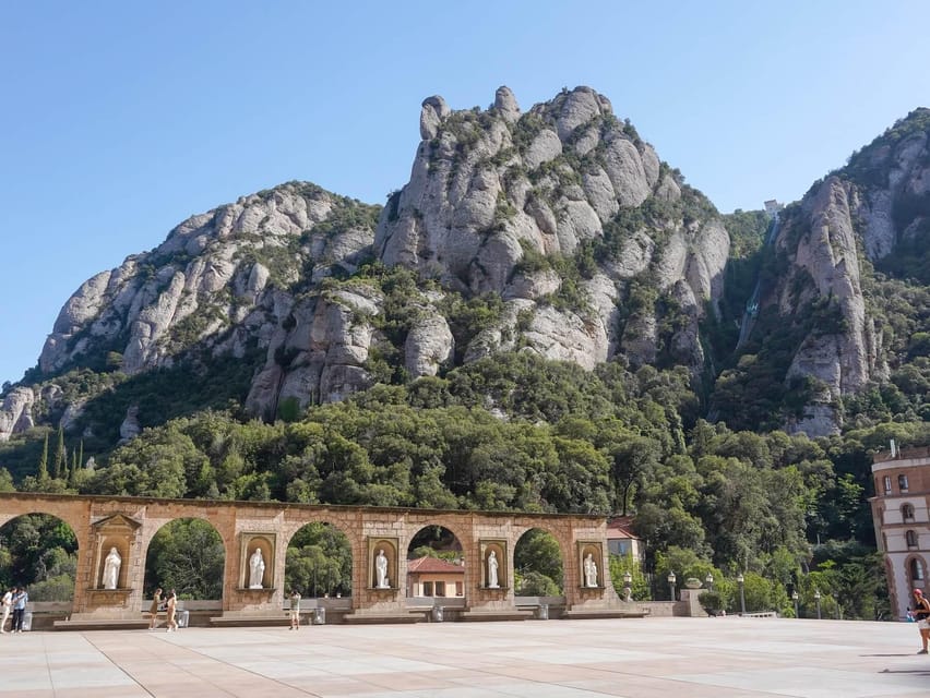 Barcelona: Montserrat Tour with Cog-Wheel & Black Madonna - Espai Audio visual Montserrat, optional video mapping, and the Escolanía choir