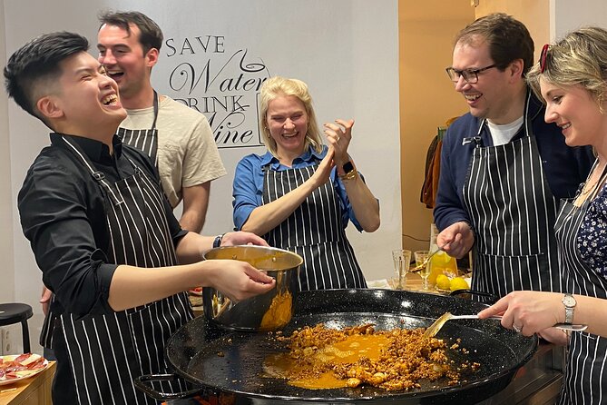 Barcelona Paella Cooking Class & Boqueria & Hofmann-Trained Chefs - Hofmann-trained socarrat over open flames
