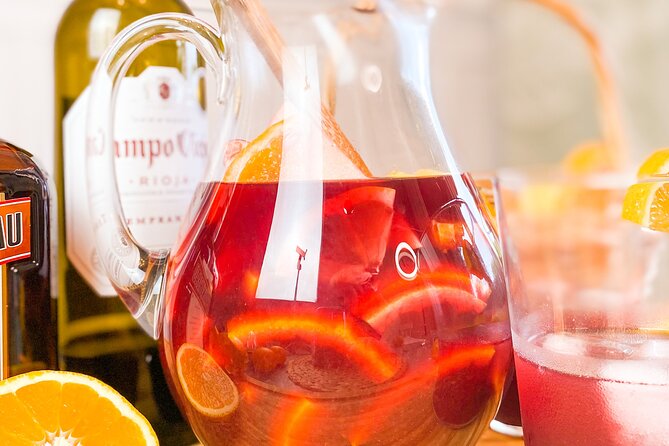 Barcelona Paella Cooking Class & Boqueria & Hofmann-Trained Chefs - Your communal feast: wine, sangria, dessert, and the little details that land
