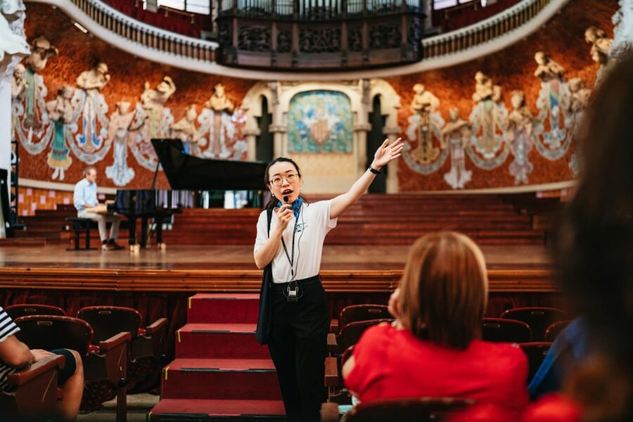 Barcelona: Palau de la Música Guided Tour - The grand staircase: floral details and flags you will want to study up close