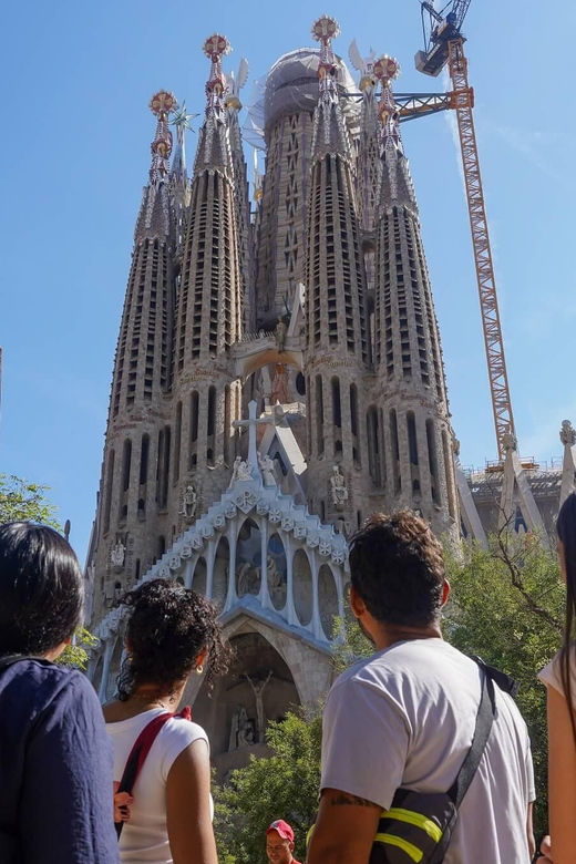 Barcelona: Sagrada Familia and Park Güell Tour - Entering Sagrada Familia: towering vaults and symbolism you can follow