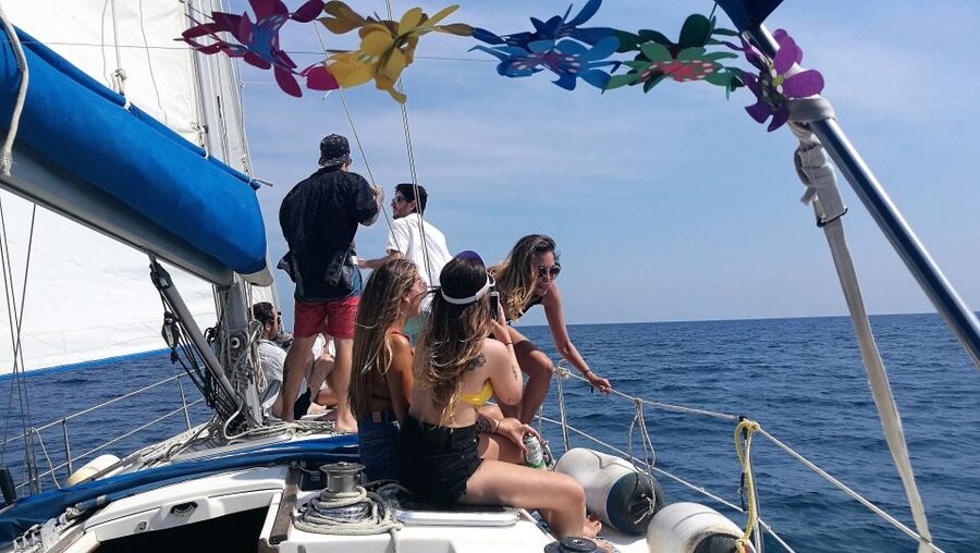 Barcelona: Sailing Trip with Drinks and Snacks - The crew: local storytelling, photo help, and music that matches the mood