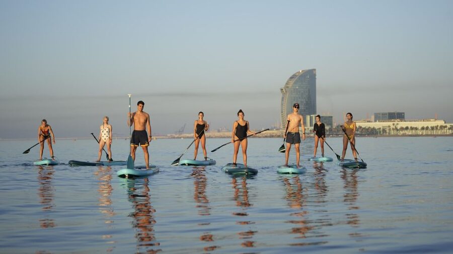 Barcelona: Sunrise Paddleboarding with Instructor and Photos - From Eswell Surf School on Carrer de Grau i Torras to the beach