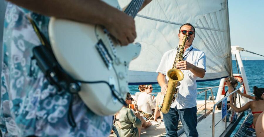Barcelona: Sunset Catamaran Cruise with Live Music - What you do during the cruise, hour by hour