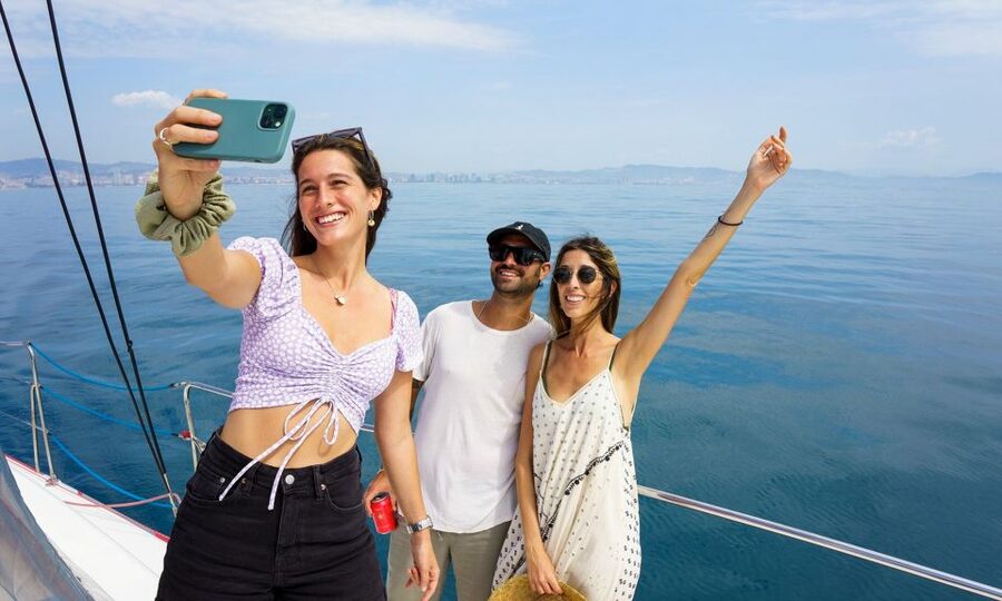 Barcelona: Sunset or Day Catamaran Cruise with Tapa & Drink - Marina Vela: the harbor setup by Barceloneta