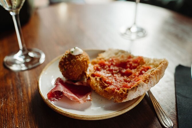 Bohemian Barcelona Neighborhood Evening Tapas & Wine Tour - Price and pacing: what $126.28 buys you in real terms