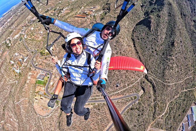 BRONZE tandem paragliding flight in South Tenerife, free pick up - Flying above Costa Adeje, with pilot commentary and thermal help
