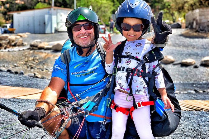 BRONZE tandem paragliding flight in South Tenerife, free pick up - Landing on La Caleta beach: soft sand, Atlantic waves, and a gentle touchdown