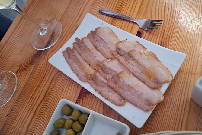Cadiz Food Tour: Tapas, Drinks and Delights with a Local - Torre Tavira pass-by and the 1961 bakery stop for take-away sweets