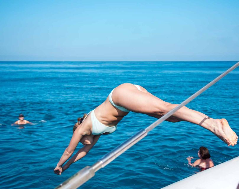 Calpe: Catamaran Tour with Optional Swim Stop - Onboard Bar Drinks and the Optional DJ for a Different Mood