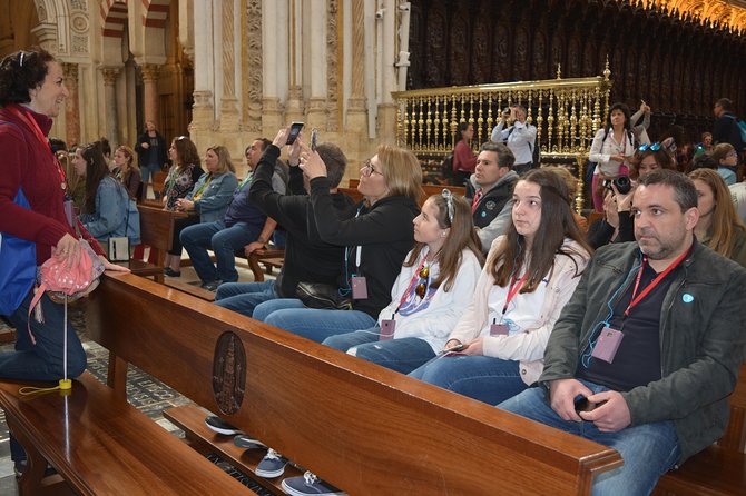 Cordoba Monuments Intensive Tour in English Tickets included - Culture stops that connect the dots: lovers, Mudéjar chapel, souk crafts, and medieval doctors