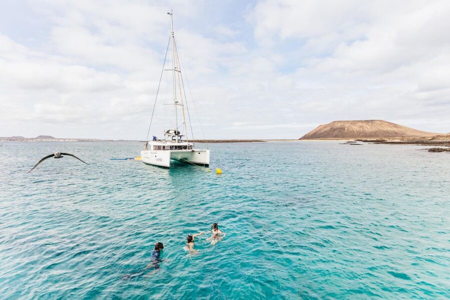 Corralejo: Lobos Island Catamaran Tour with Drinks & Snorkel - The Lobos Island Stop: Mini-Guided Walk and How Much Time You Really Have