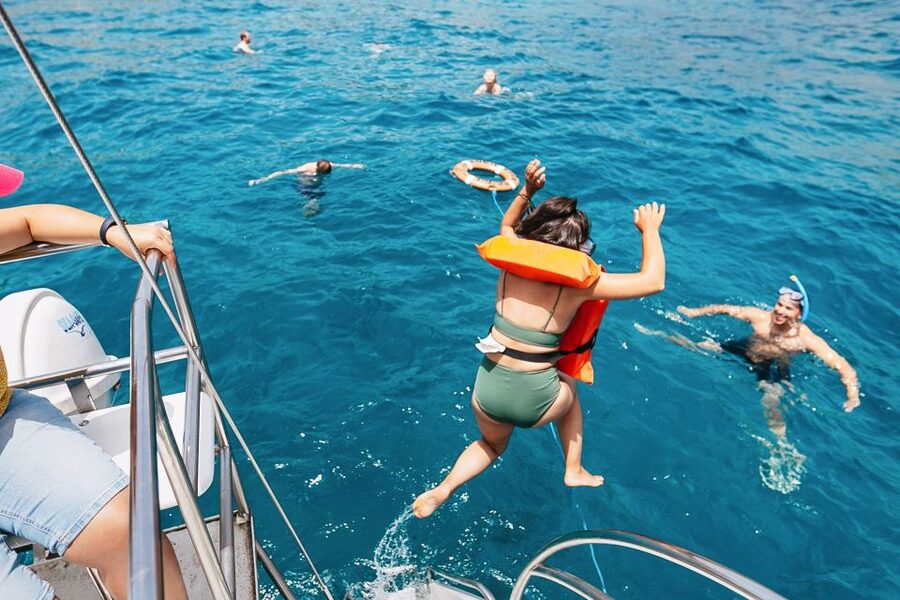 Costa Adeje: Whale Watching Catamaran Tour with Drinks - Onboard vibe and amenities: drinks, music, and getting a good view