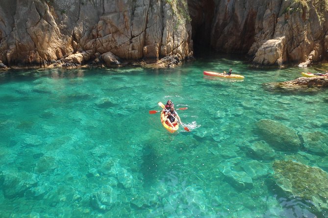 Costa Brava Kayaking and Snorkeling Small Group Tour with Lunch - Kayaking below the Camino de Ronda (plus those cliff jump moments)