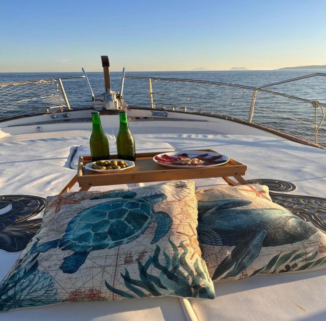 Estepona: Dolphins Searching Sea Cruise with Drink & Snacks - Sunset time and cruising back to the dock