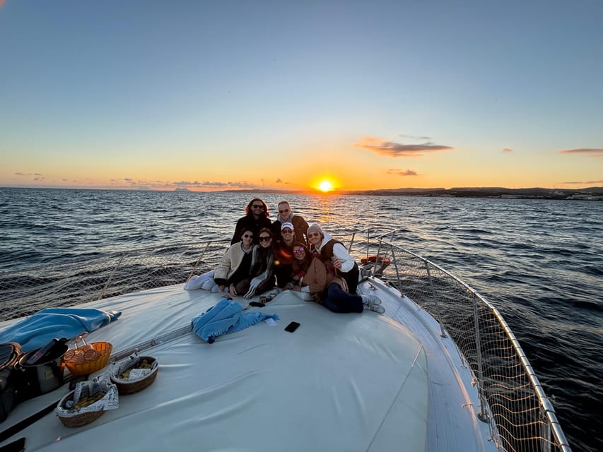 Estepona: Dolphins Searching Sea Cruise with Drink & Snacks - Boarding La Martingala in Estepona: the boat setup matters