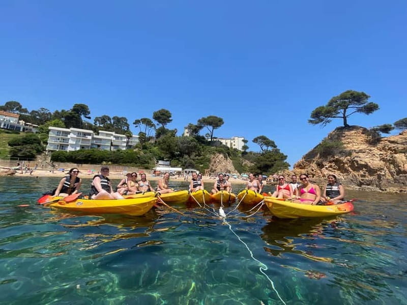 From Barcelona: Costa Brava Kayak & Snorkel Tour with Picnic - Getting geared up at the beach before you paddle