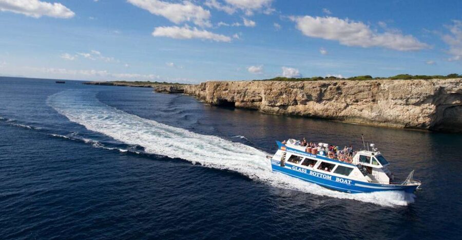 From Cala Galdana: 2-Hour Glass-Bottom Boat Trip - Meeting at Passatge Riu, 24 and how the day starts