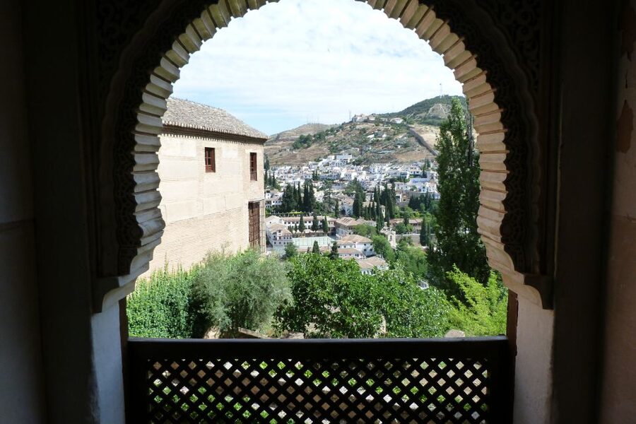 From Costa del Sol or Malaga: Granada and Alhambra Tour - Granada first, then the Alhambra hill: how the day usually flows