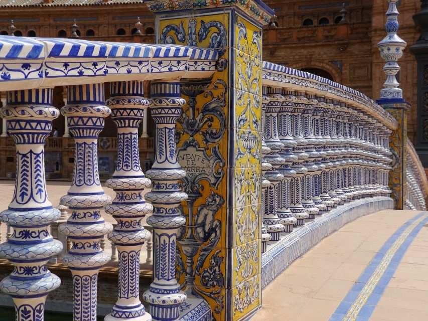 From Costa del Sol: Seville Day Trip - Guadalquivir Riverbanks, Triana Bridge, and Torre del Oro