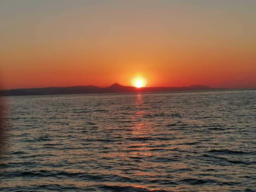 From Denia: Catamaran Trip with Sunset Option - On Board Vibe: Music, Drinks, and Crew Energy