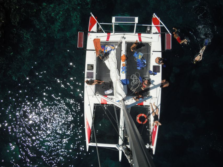 From Fornells: Half-Day Menorca Catamaran Trip w/ Snorkeling - Price and value: $88 for 3 hours on the water