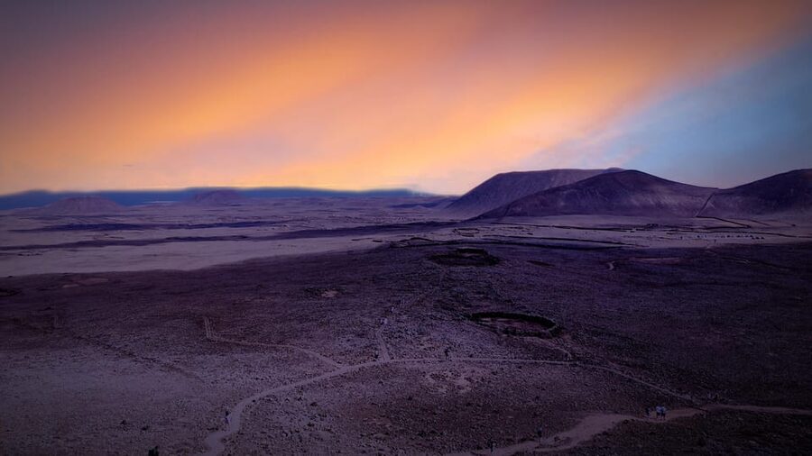From Fuerteventura: Sunset Hike at Volcano with Scenic Views - The 3-hour flow: bus pickup, hike up, and crater-top sunset