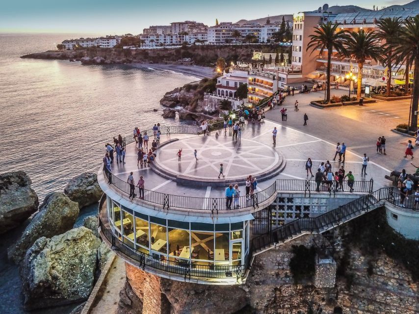 From Málaga: Caves of Nerja, Nerja and Frigiliana Day Tour - Nerja Caves: The Natural Cathedral, the 32-Meter Column, and Paleolithic Stories