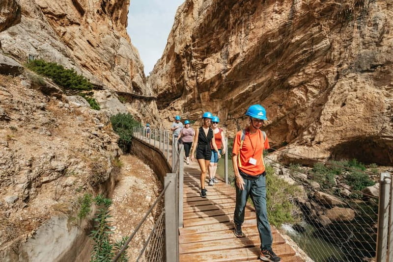 From Málaga & Costa del Sol: Caminito del Rey Guided Tour - The northern access point: tunnel, checkpoint, and helmets