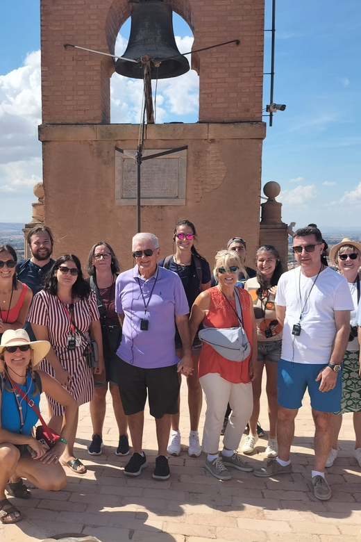 From Malaga: Day Trip to Alhambra by Bus with Entry Tickets - Entering the Alhambra: skip-the-line entry plus headsets