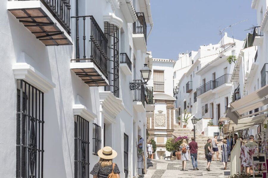 From Malaga: Nerja and Frigiliana Tour - Nerja Caves Option: Prehistoric Halls, Timing, and Crowds
