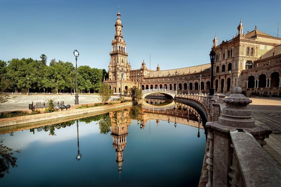 From Malaga: Seville Day Trip and Optional Monument Tickets - Triana and the river: San Telmo Bridge to a different Seville