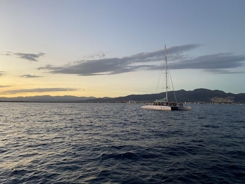 From Roses: Sunset Catamaran Cruise - The Sailout: Relaxing Time on the Water With Music and a Drink