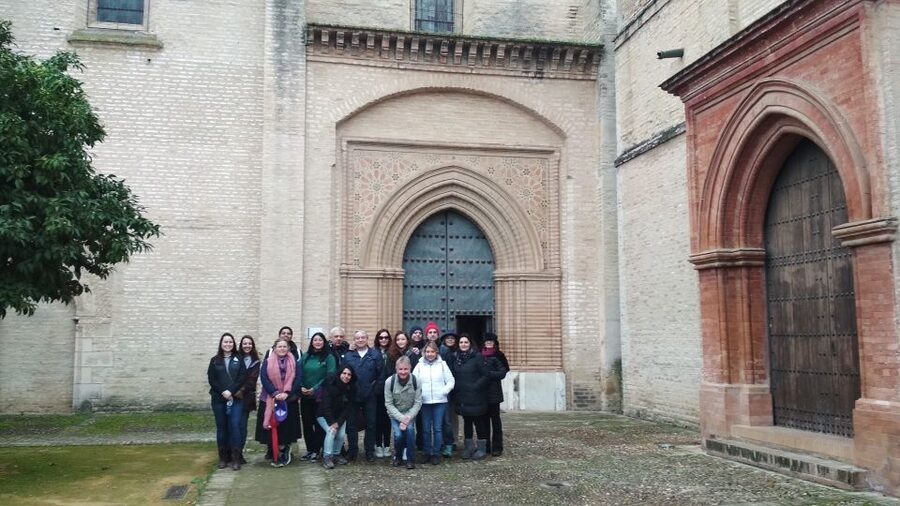 From Seville: Italica Roman City & Medieval Monastery Tour - San Isidoro del Campo monastery: a medieval fortress in Mudejar, Gothic, Baroque layers
