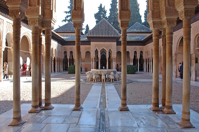 Full-Day Alhambra from Malaga: Choose Your Access & Pick Up Point - The Granada pause before the Alhambra entrance