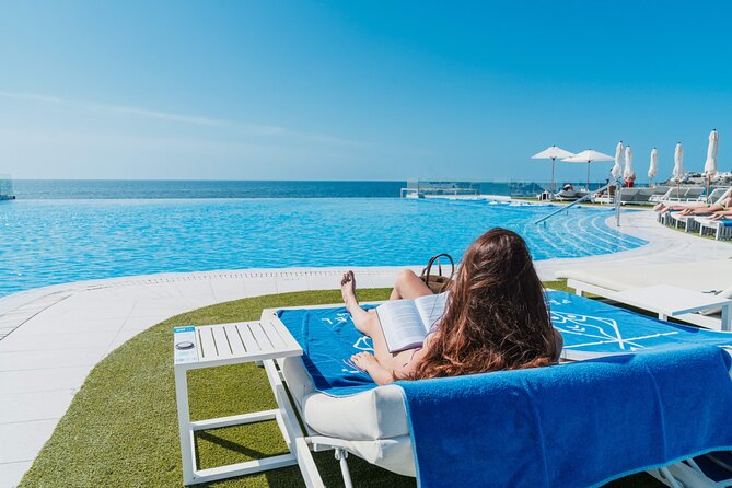 Full Day Ticket at Perchel Beach Club with Lunch - Infinity pool and solarium comfort: where the day actually happens