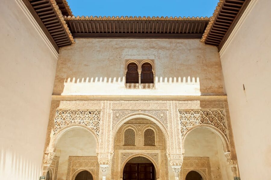 Granada: Alhambra and Albaicín Small Group Tour - Albaicín after the palaces: cobblestones, balconies, and fortress views