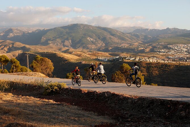 Granada: Alhambra and Sierra Nevada Sunset Views by E-Bike - Sacromonte caves and flamenco traditions, seen from the outside in