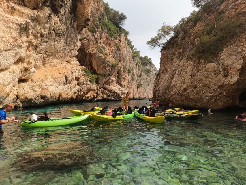 Granadella: Caló, Cova Llop Marí, and Ambolo Kayak Trip - Ambolo (Naturista): a short paddle to a very different vibe